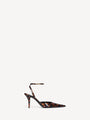 Pumps mit Riemchen aus bedrucktem Lackleder