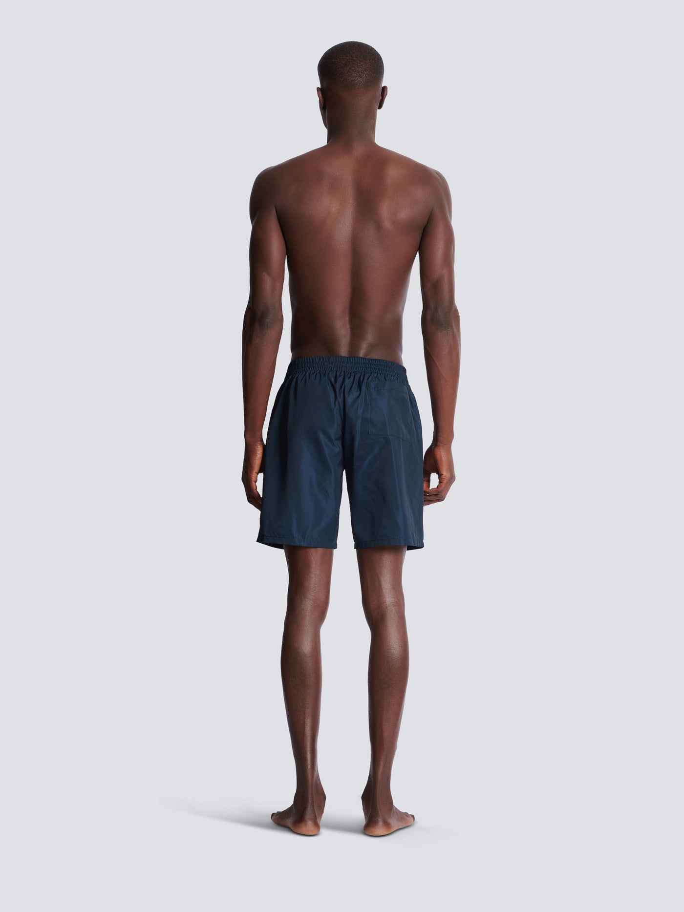 Swim shorts with Balmain College logo