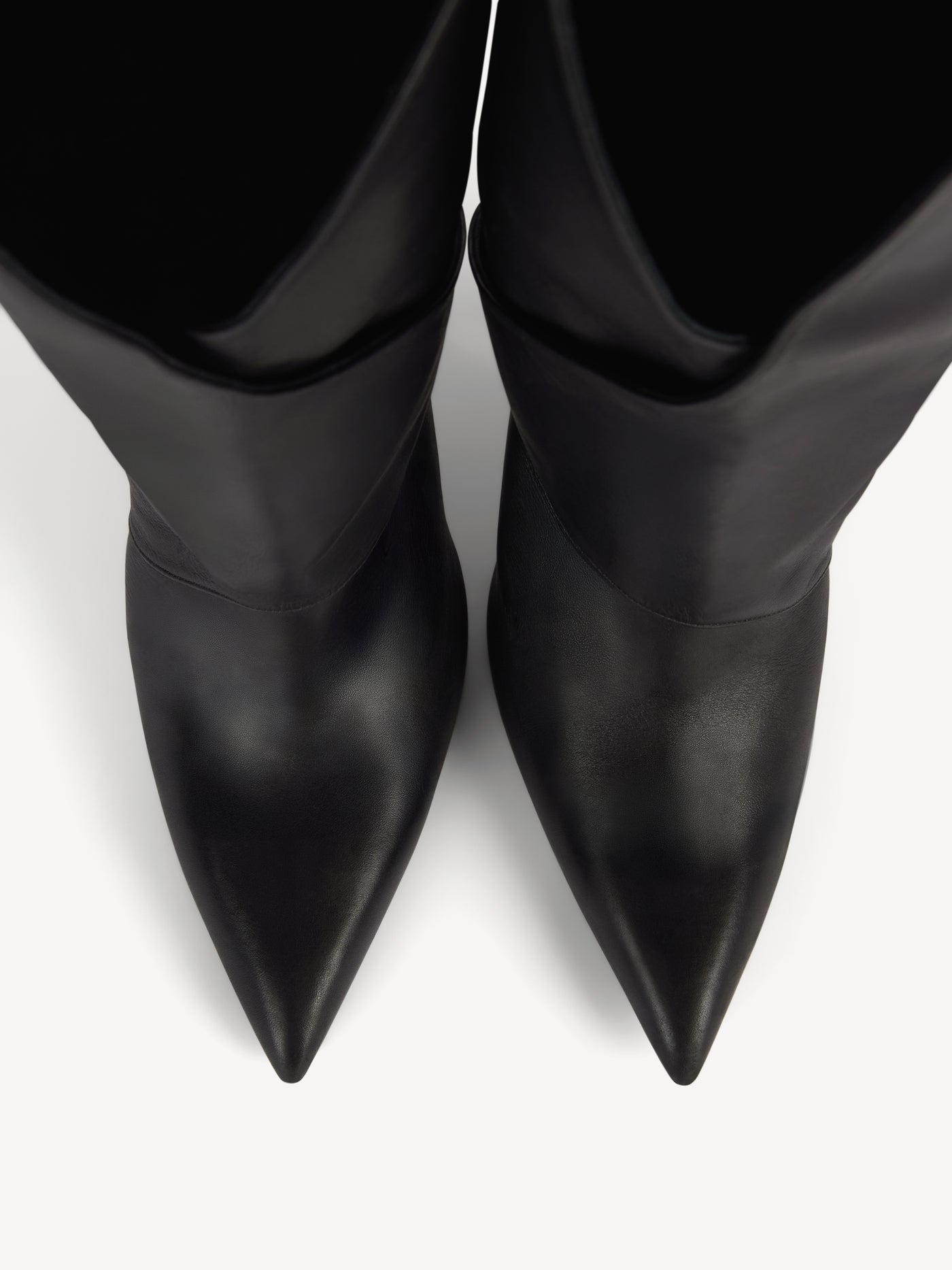 Twist heeled leather boots