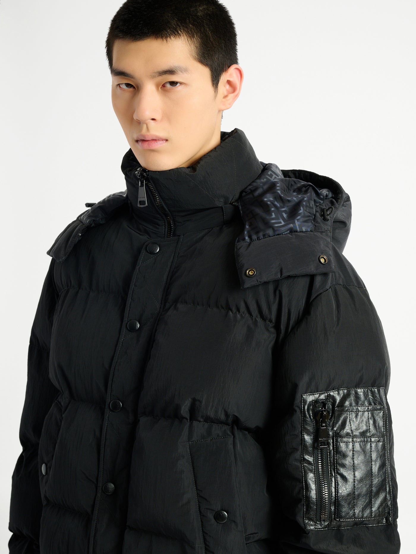 Padded nylon and leather jacket