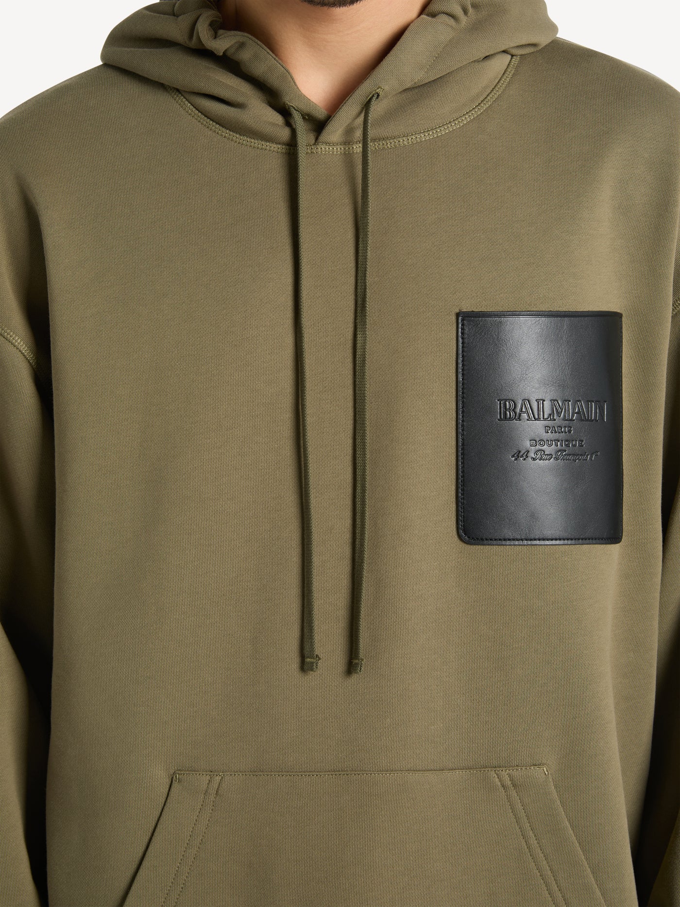 Kapuzenpullover mit Balmain Vintage-Etikett aus Leder