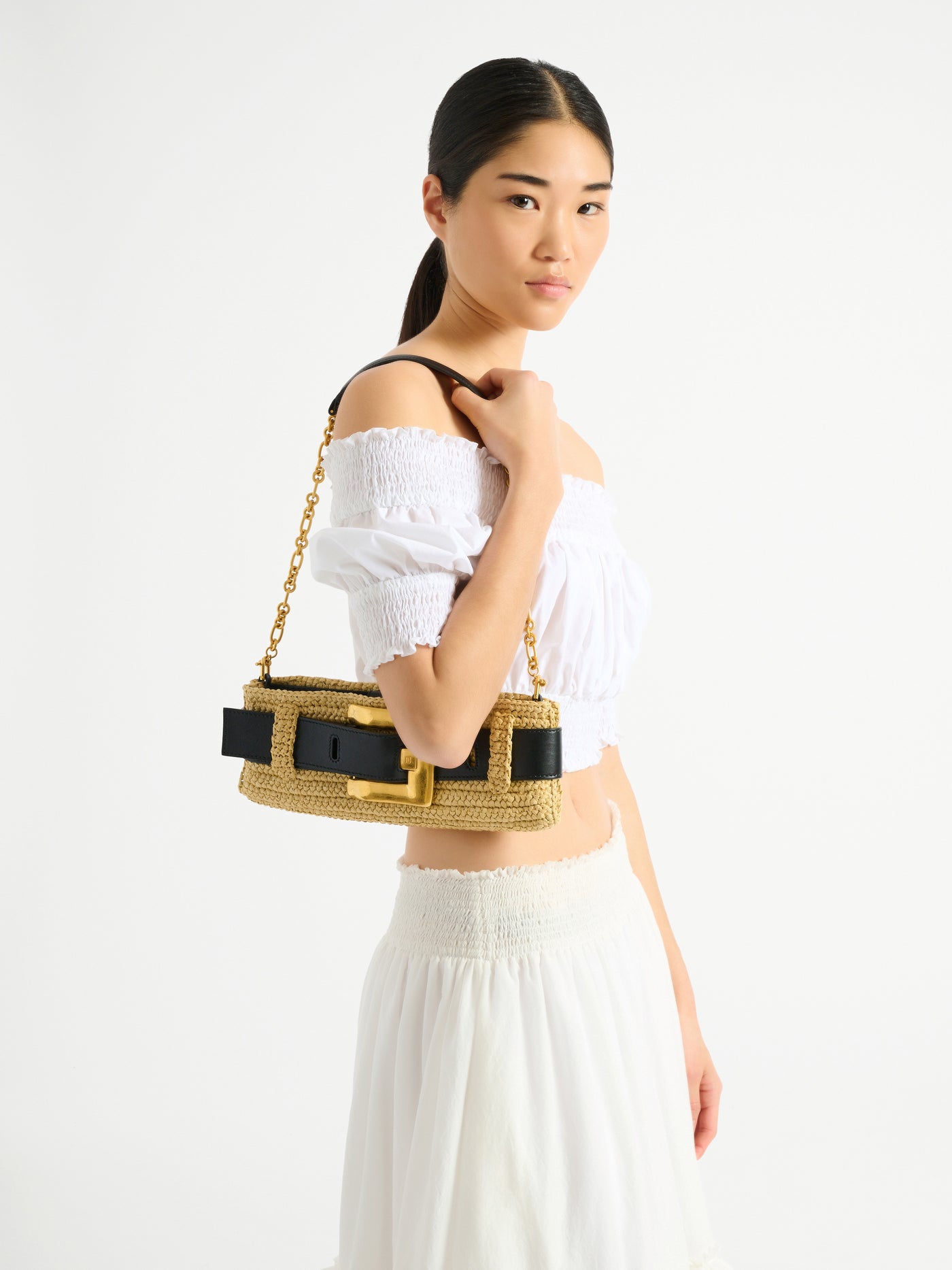 Pochette Anthem en crochet et cuir lisse