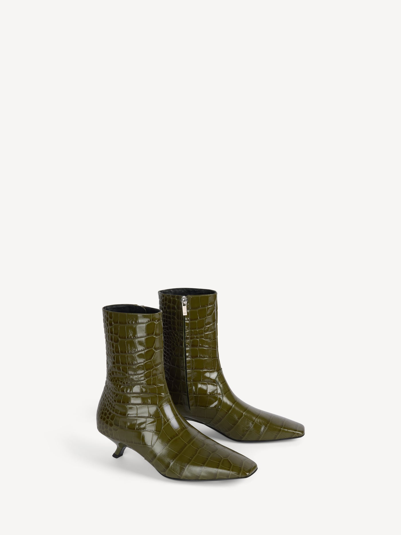 Ankle boots in embossed crocodile-print leather
