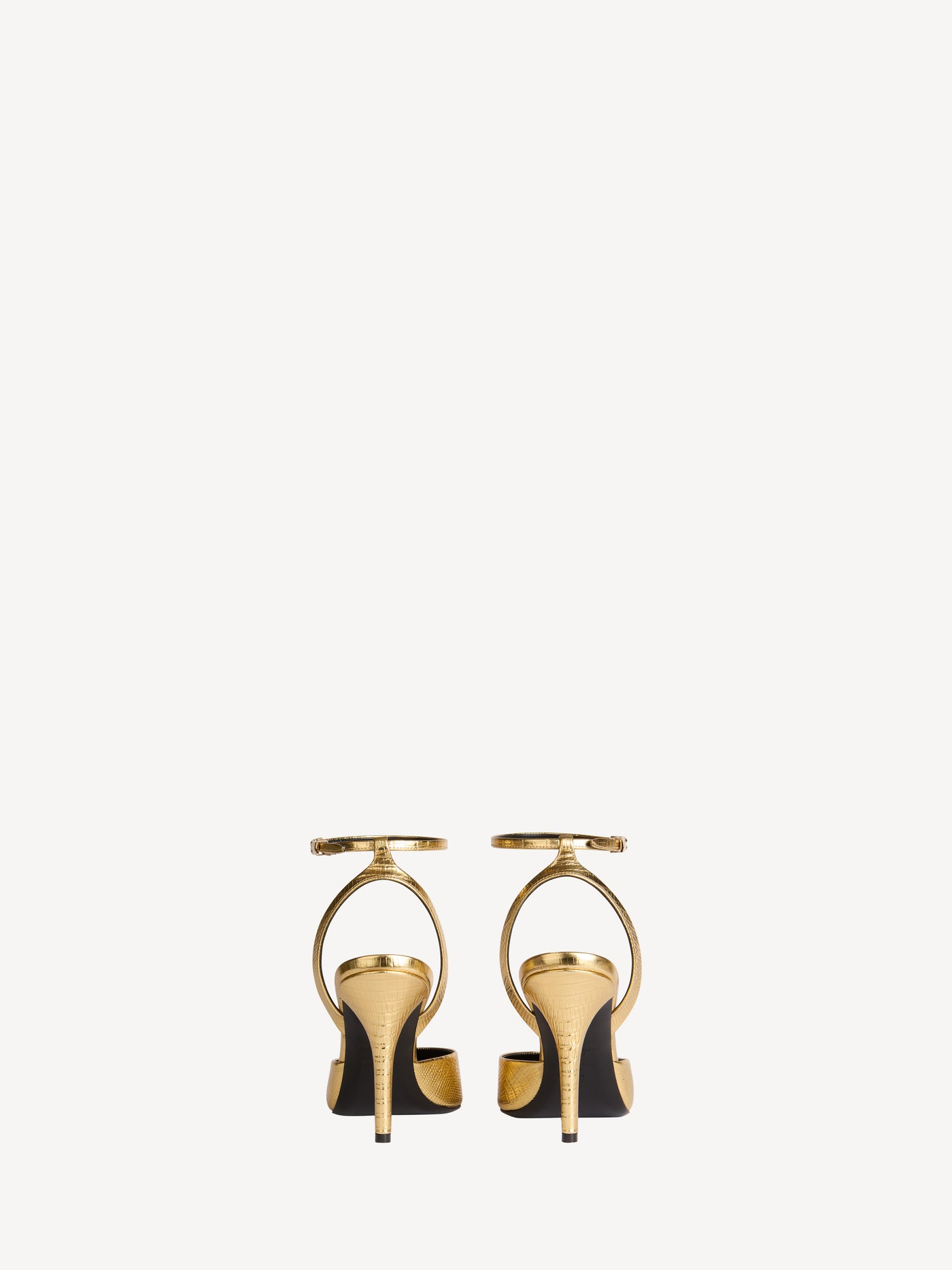 Zapatos de tacón con tiras de piel repujada metalizada