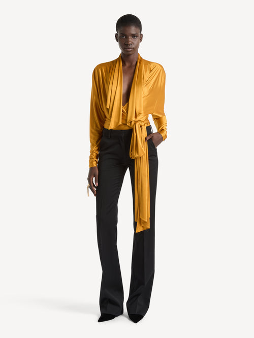 Low-waisted wool satin trousers